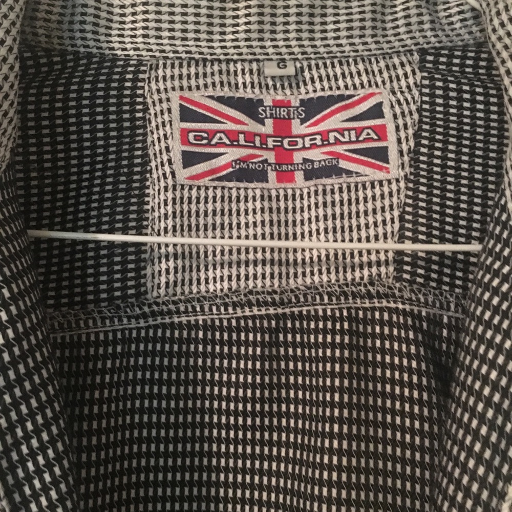 Button down long sleeve shirt with leather collar